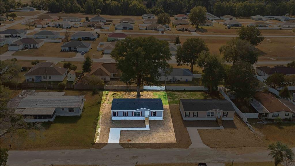 1560 Northeast 162nd Street Citra, FL 32113 - Photo 30 of 33 a view of swimming pool with a yard
