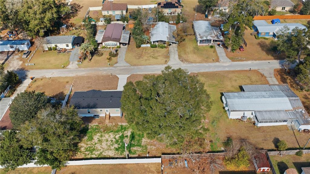 1560 Northeast 162nd Street Citra, FL 32113 - Photo 32 of 33 an aerial view of residential houses with outdoor space