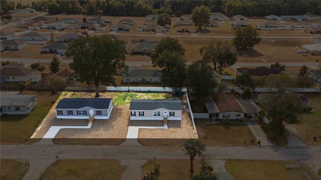 1560 Northeast 162nd Street Citra, FL 32113 - Photo 4 of 33 an aerial view of a house with outdoor space