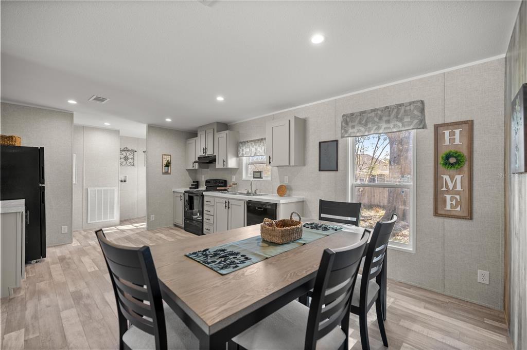 1560 Northeast 162nd Street Citra, FL 32113 - Photo 9 of 33 a view of a dining room with furniture