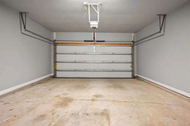 an empty room with closet area