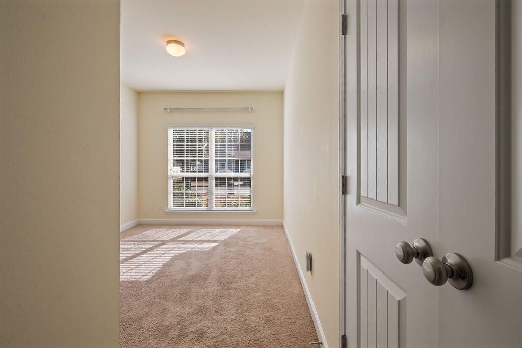 108 Nelly Street Freeport, FL 32439 - Photo 22 of 59 a view of a room that has a window and a bath tub