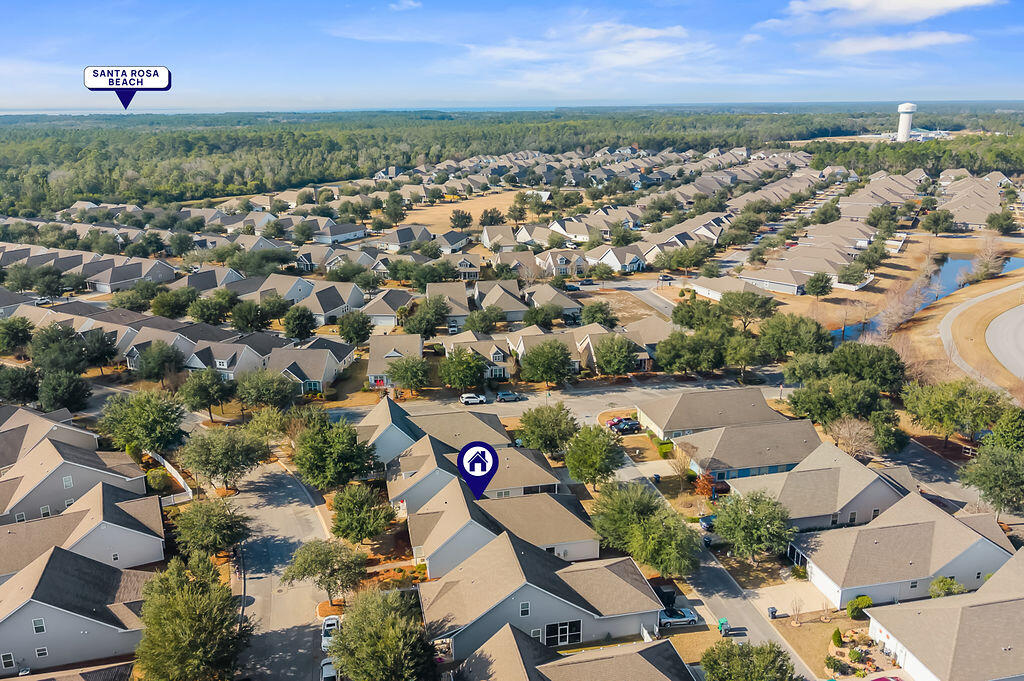 108 Nelly Street Freeport, FL 32439 - Photo 28 of 59 an aerial view of a city with lots of residential buildings