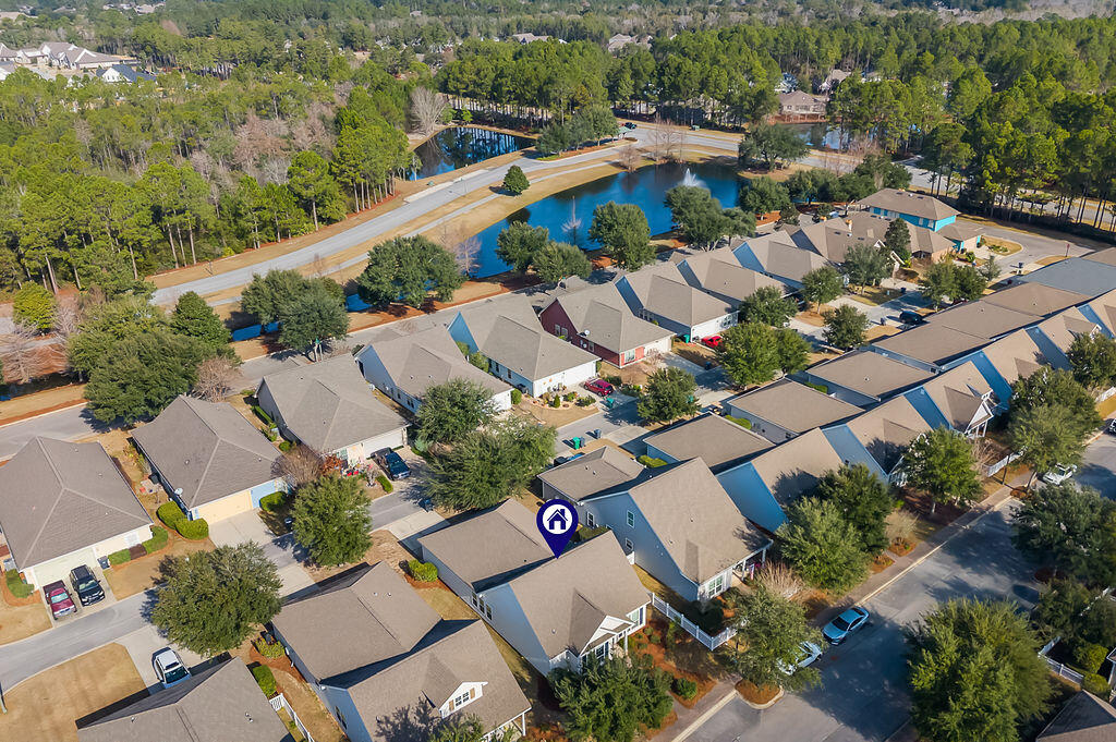 108 Nelly Street Freeport, FL 32439 - Photo 31 of 59 an aerial view of a house with a garden