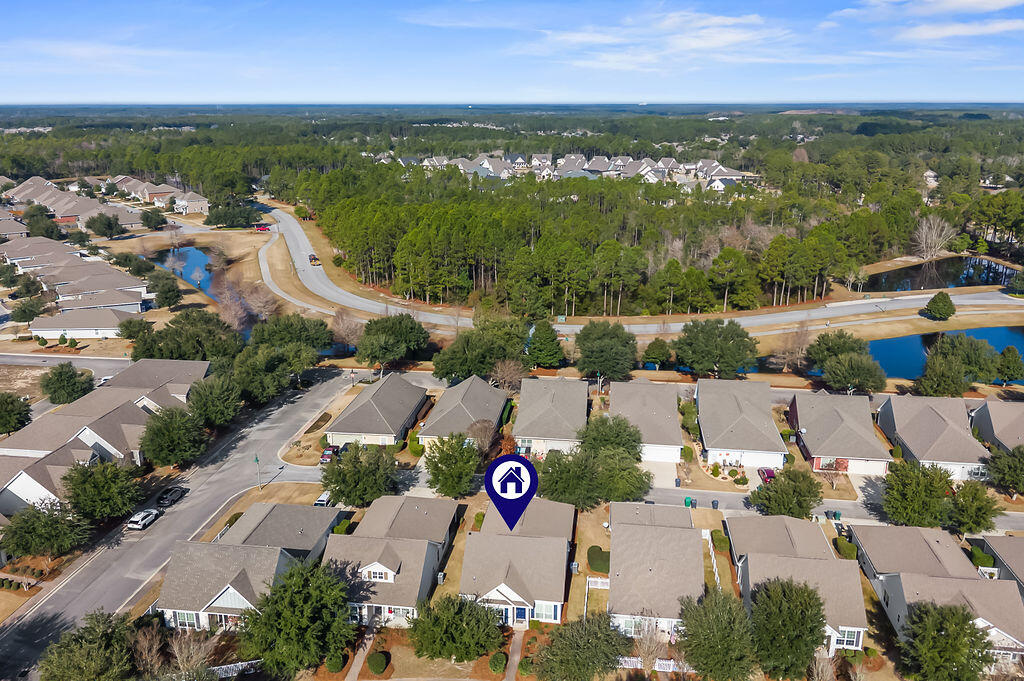 108 Nelly Street Freeport, FL 32439 - Photo 32 of 59 an aerial view of residential building and lake