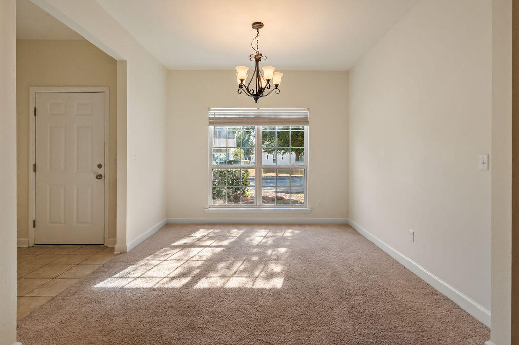 108 Nelly Street Freeport, FL 32439 - Photo 6 of 59 a view of a windows and an entryway in a room