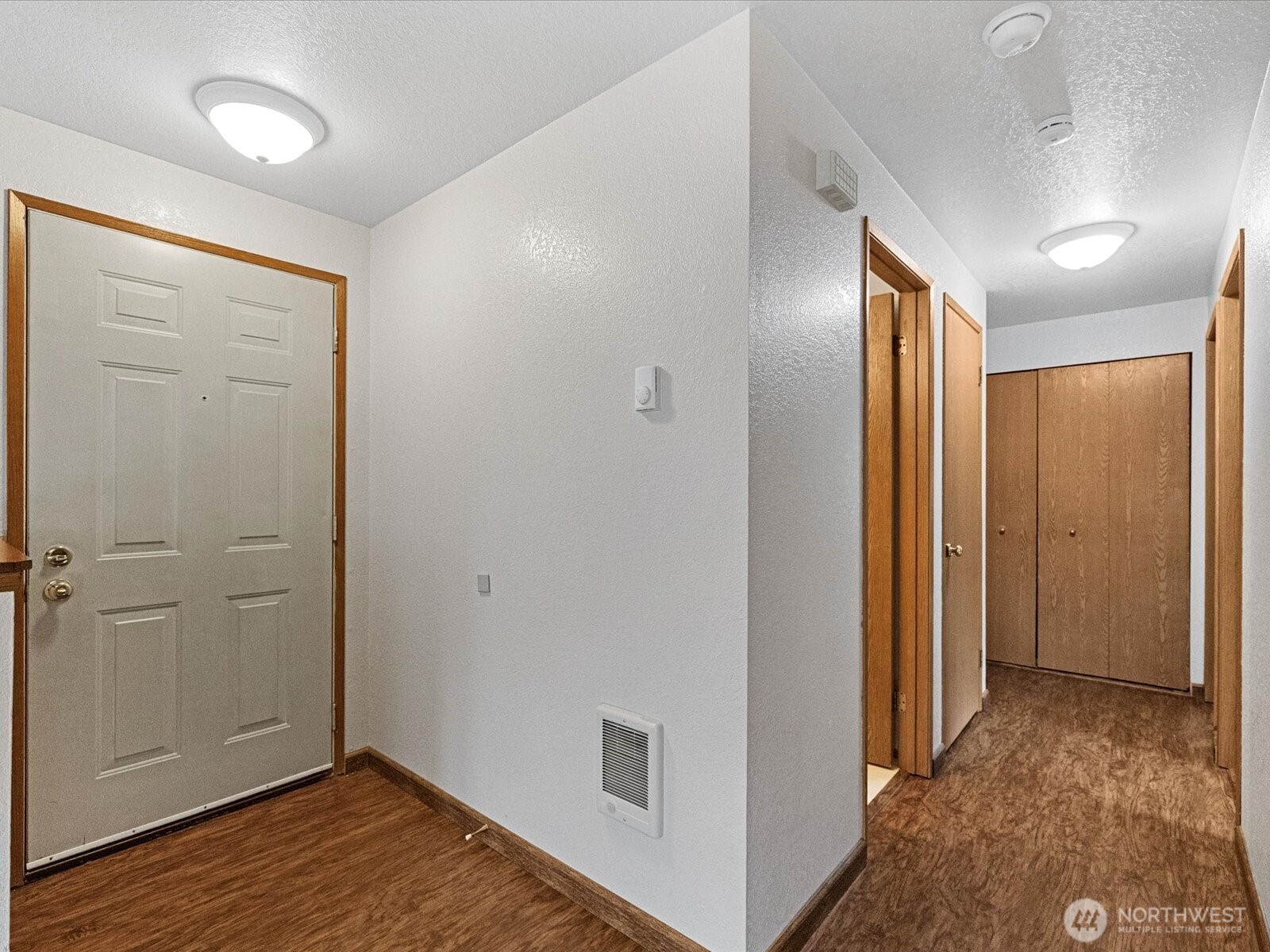 13411 Meadow Road Everett, WA 98208 - Photo 14 of 40 a view of hallway with wooden floor