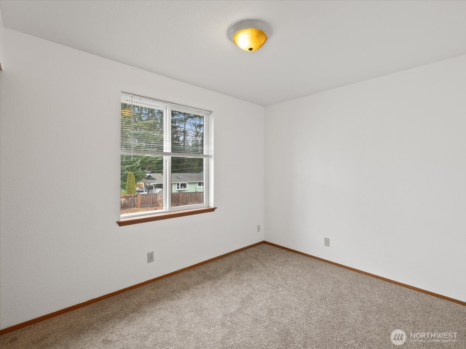 13411 Meadow Road Everett, WA 98208 - Photo 19 of 40 an empty room with a window
