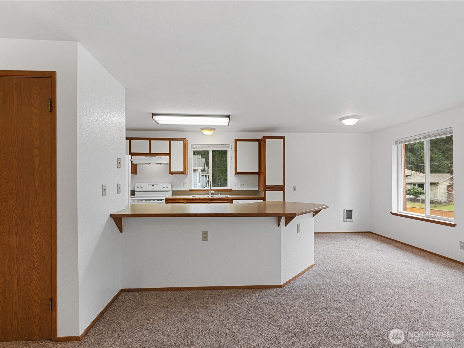 13411 Meadow Road Everett, WA 98208 - Photo 33 of 40 a view living room with granite countertop furniture and window