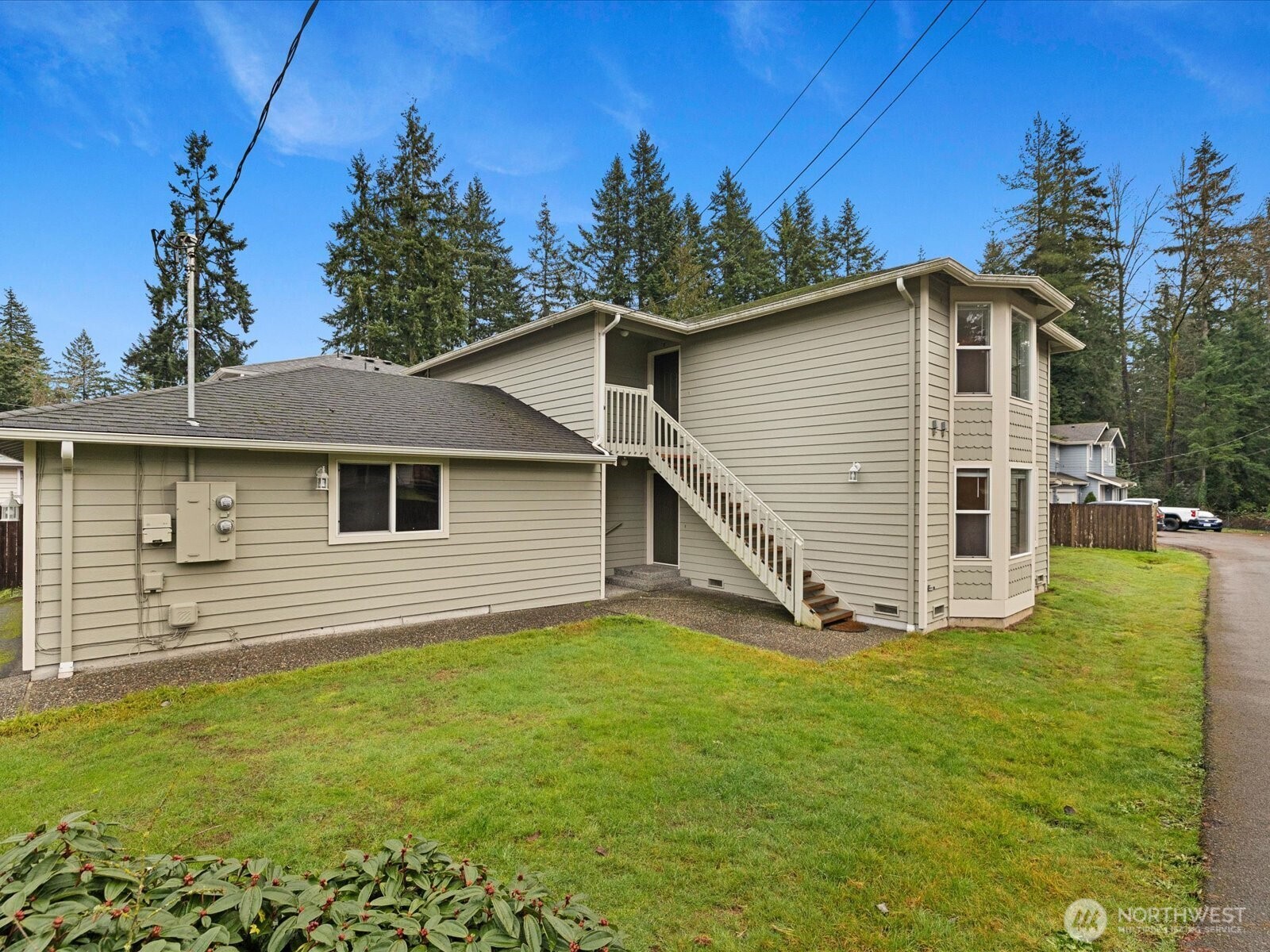13411 Meadow Road Everett, WA 98208 - Photo 6 of 40 a view of a house with a yard