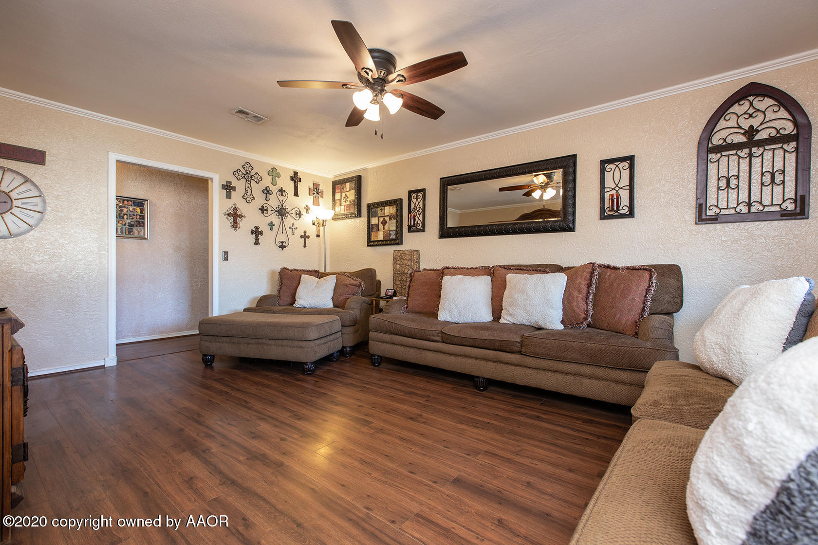 6017 Calumet Road Amarillo, TX 79106 - Photo 2 of 31 a living room with furniture and a flat screen tv