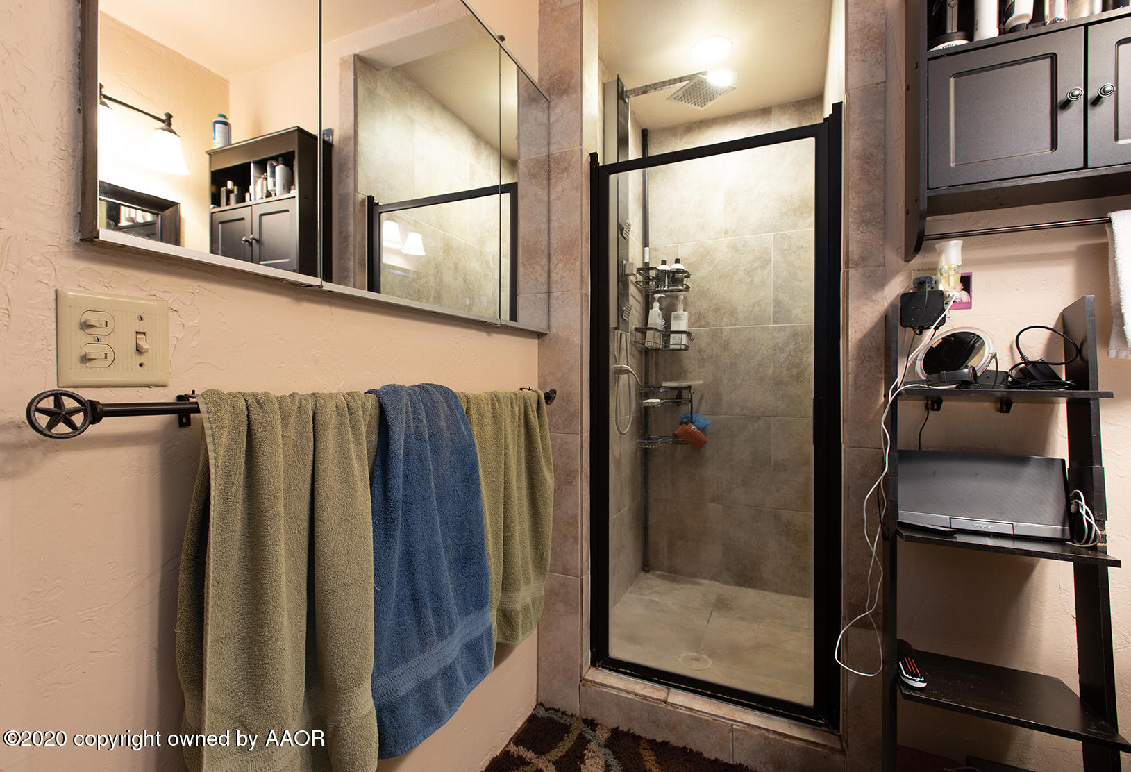 6017 Calumet Road Amarillo, TX 79106 - Photo 25 of 31 a bathroom with a shower