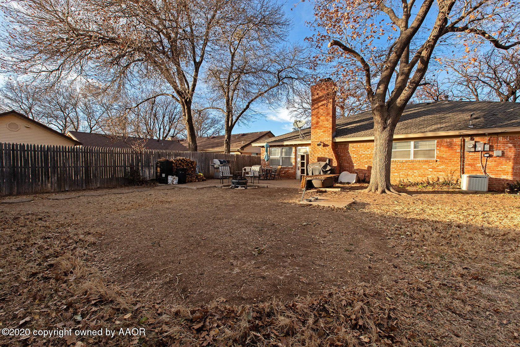 6017 Calumet Road Amarillo, TX 79106 - Photo 27 of 31 a row of palm trees in front of house