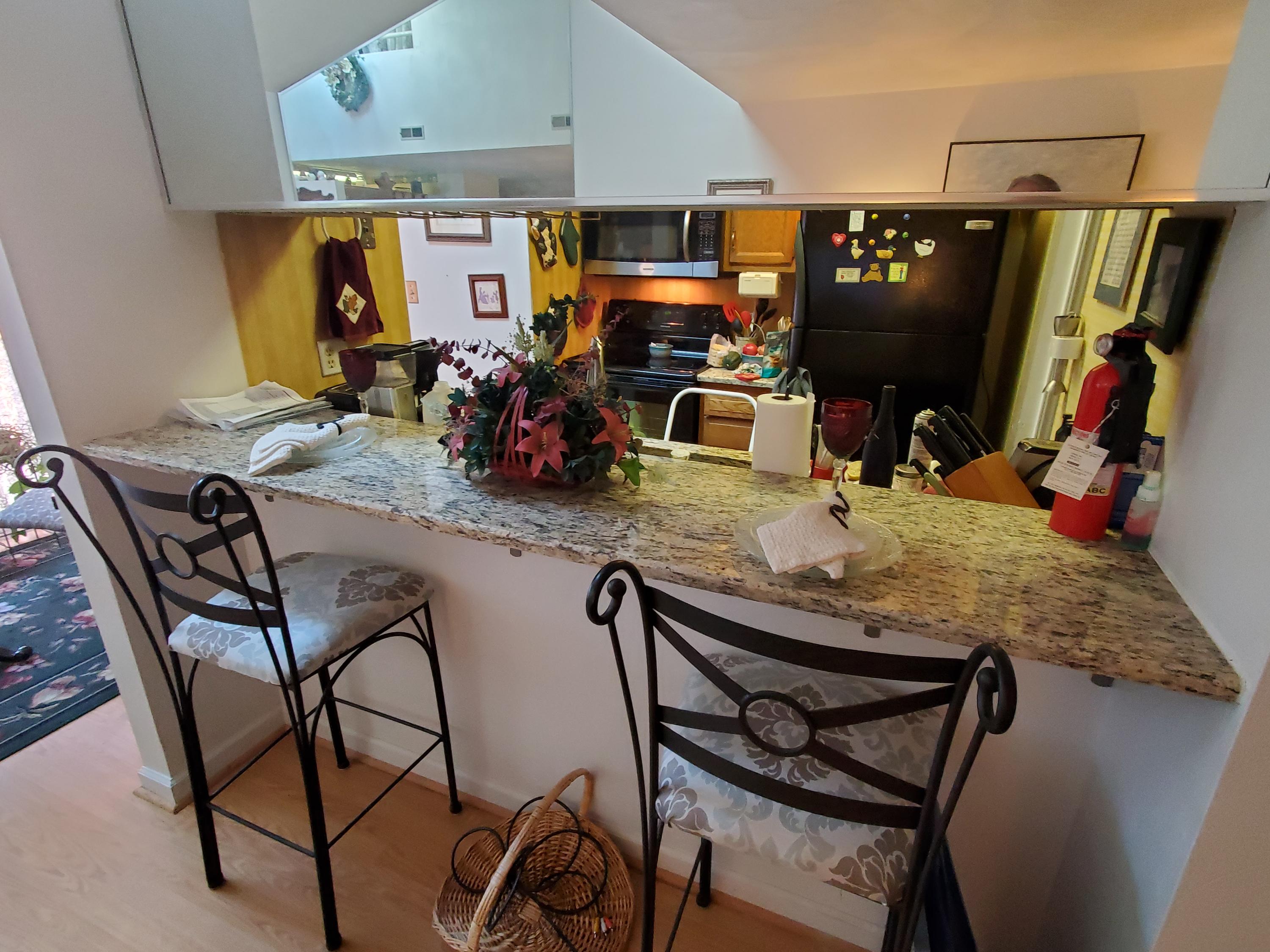 3337 Forest Ridge Road Roanoke, VA 24018 - Photo 12 of 36 a view of a dining room with furniture and a flat screen tv
