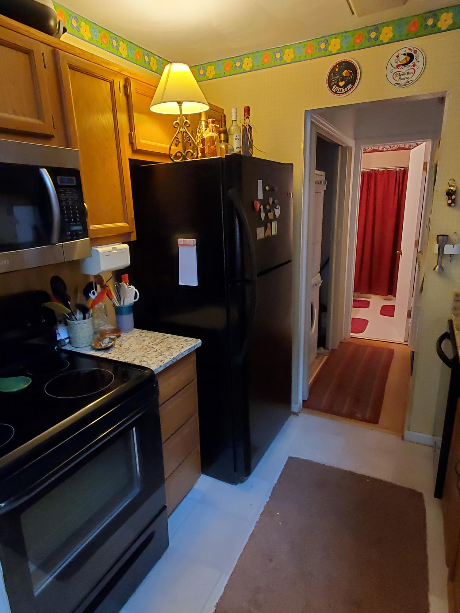 3337 Forest Ridge Road Roanoke, VA 24018 - Photo 20 of 36 a kitchen with stainless steel appliances a stove and a microwave