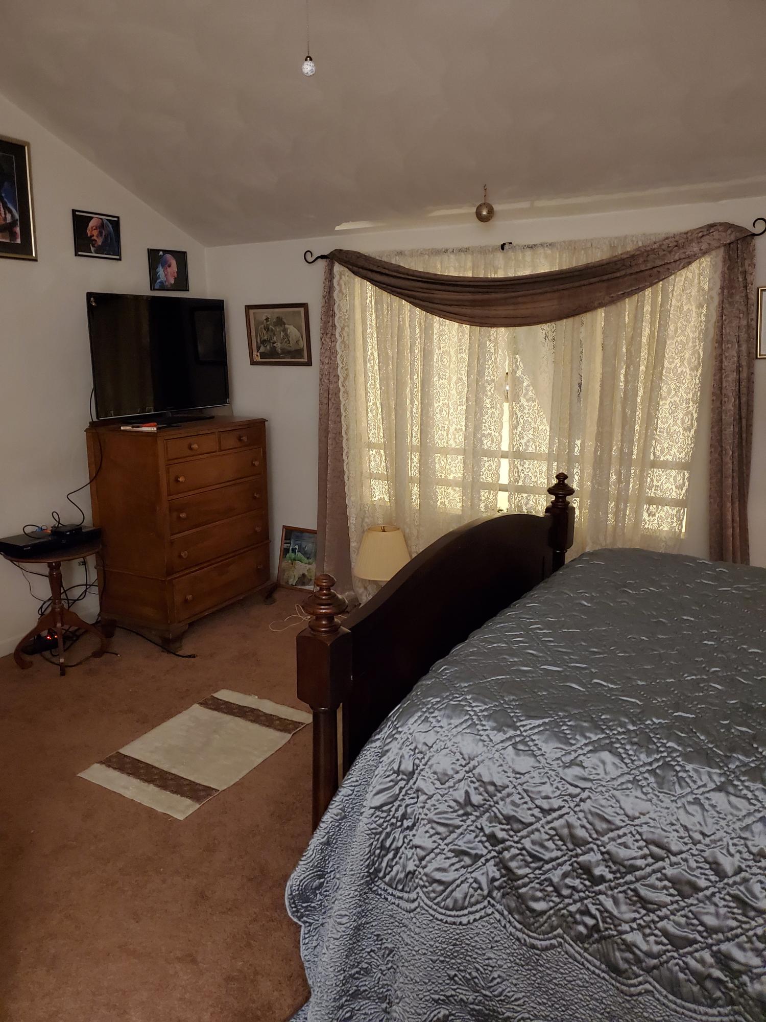 3337 Forest Ridge Road Roanoke, VA 24018 - Photo 27 of 36 a bedroom with a bed and a television