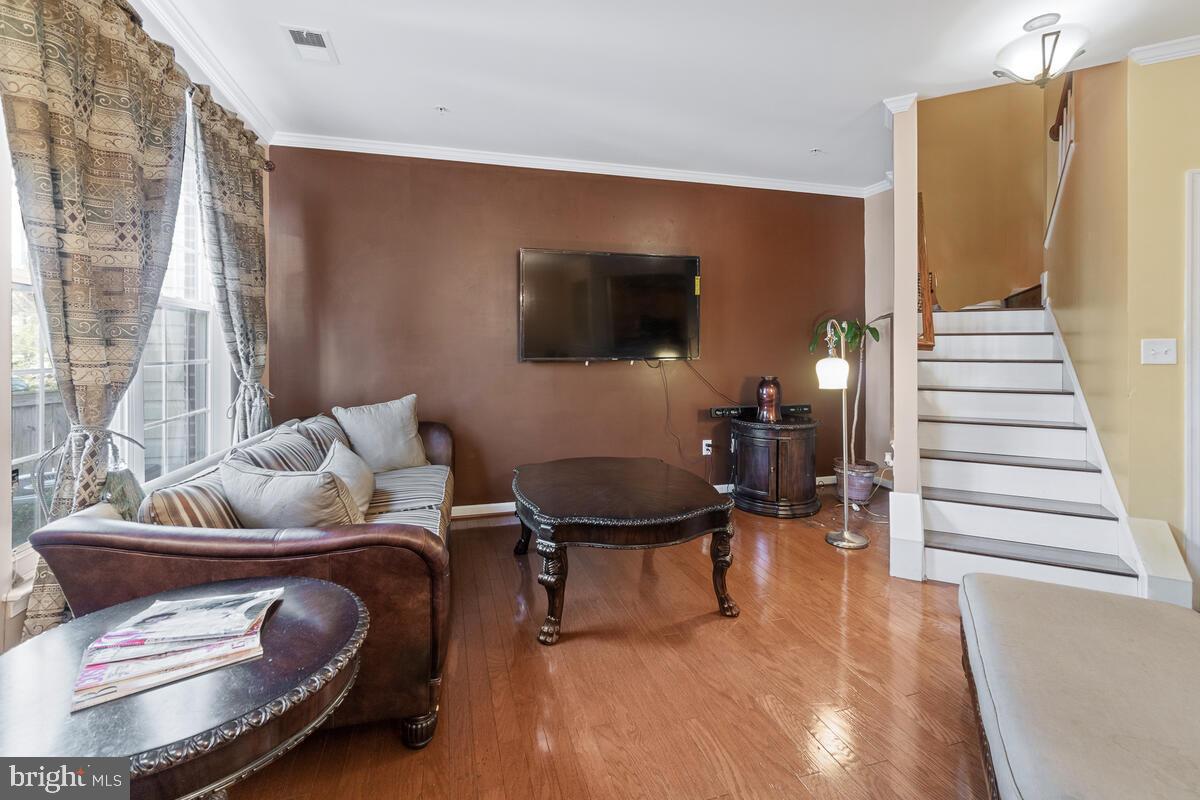 112 Featherstone Place Frederick, MD 21702 - Photo 2 of 27 Beautiful hardwoods throughout the main level.