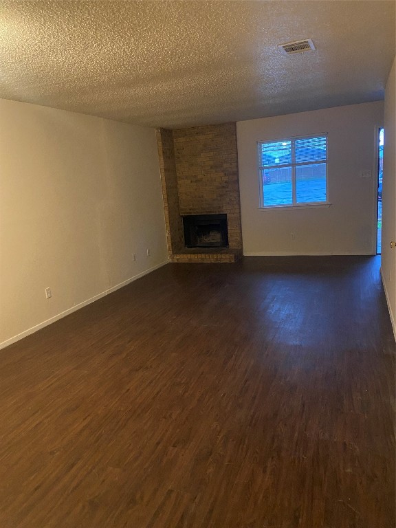 8412 Garcreek Circle, Unit B Austin, TX 78724 - Photo 11 of 13 Living area with Fireplace