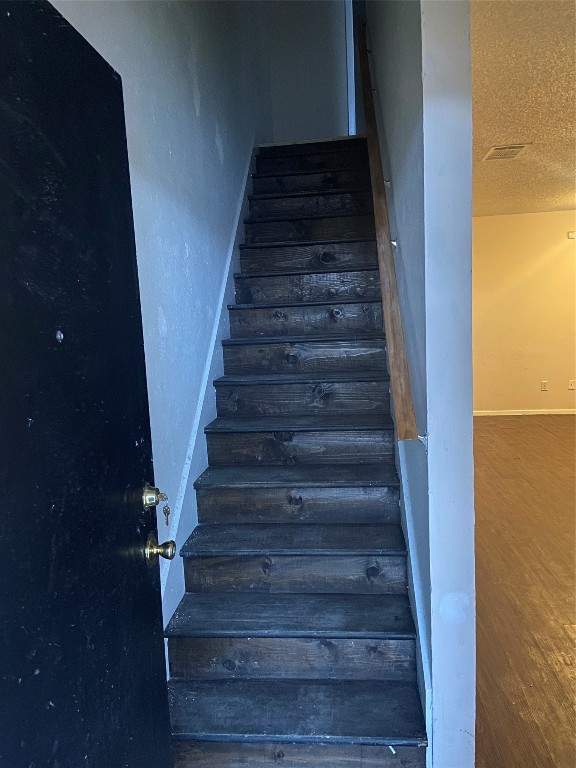 8412 Garcreek Circle, Unit B Austin, TX 78724 - Photo 13 of 13 Stairs to bedrooms