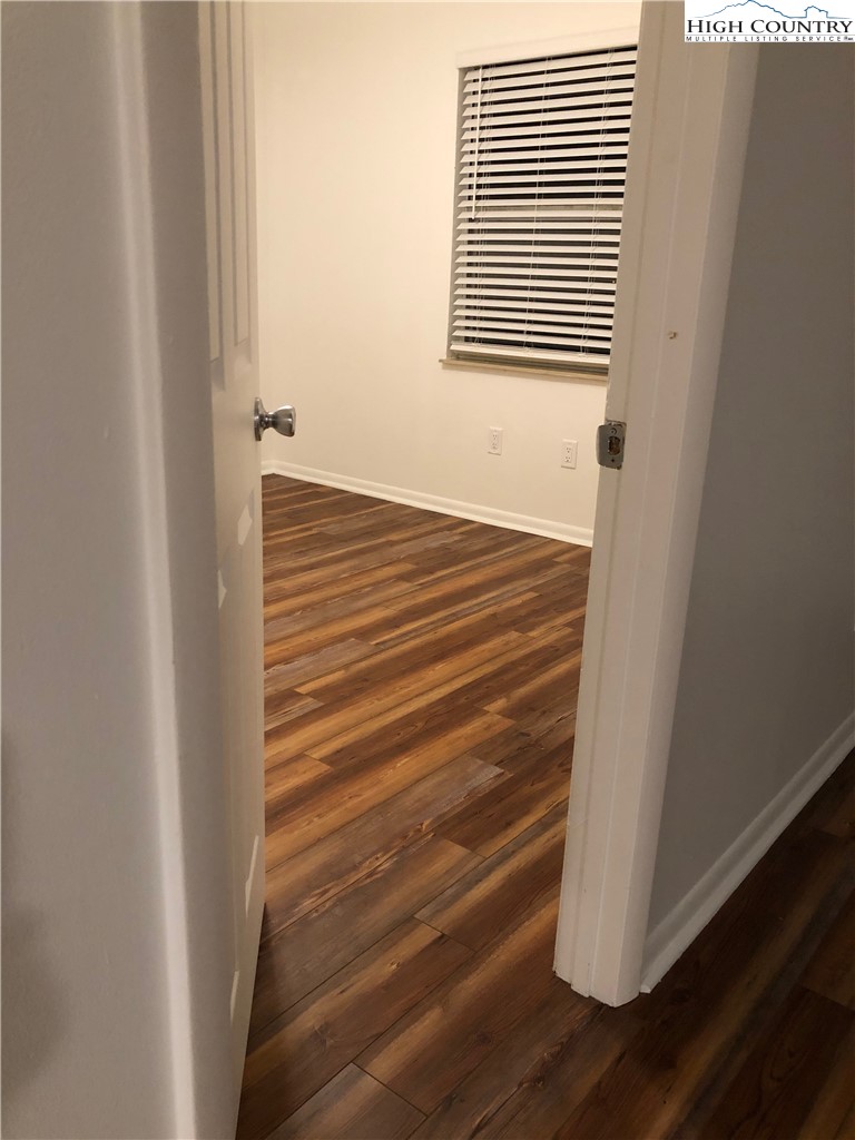 229 East King Street, Unit 9(1I) Boone, NC 28607 - Photo 11 of 19 a view of wooden floor
