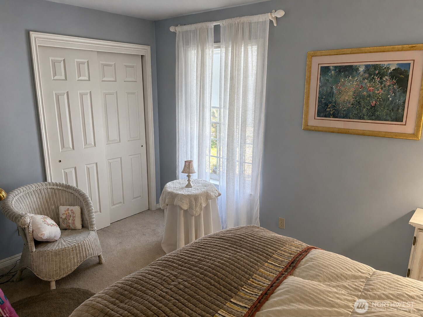 492 Pine Creek Road Tonasket, WA 98855 - Photo 19 of 37 a bedroom with a bed and a chair
