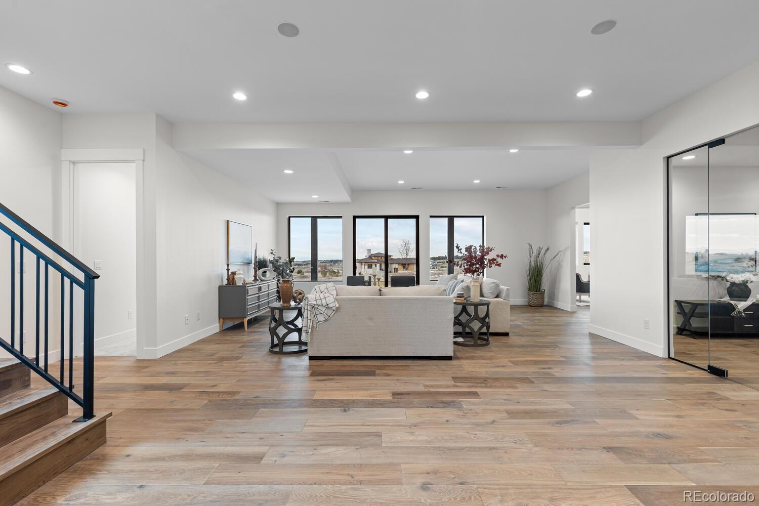11115 Evening Hunt Road Franktown, CO 80116 - Photo 31 of 46 a view of kitchen with furniture and refrigerator