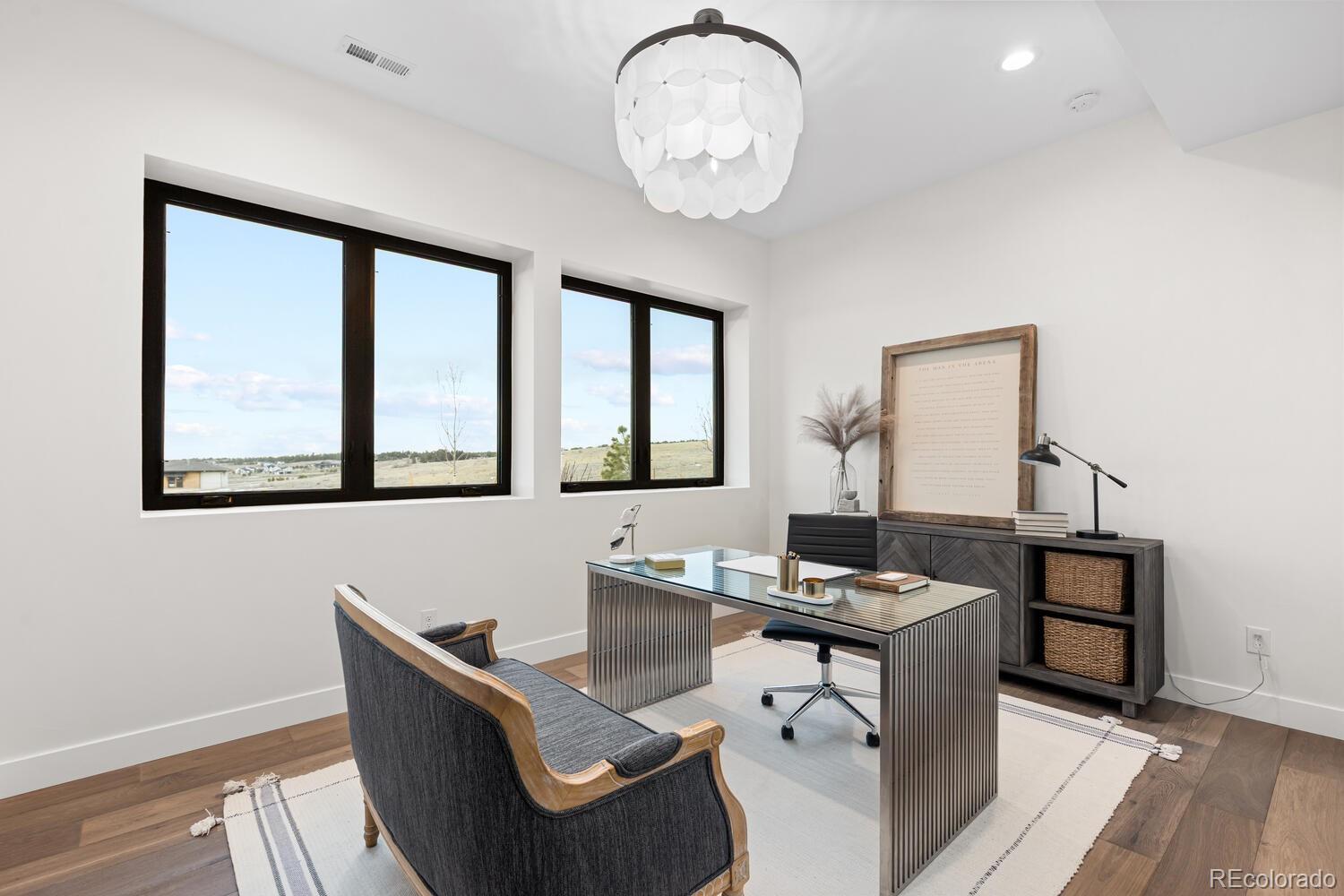 11115 Evening Hunt Road Franktown, CO 80116 - Photo 34 of 46 a workspace with furniture and window