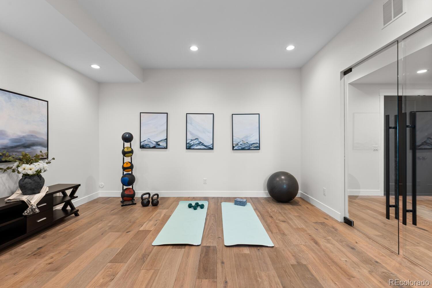 11115 Evening Hunt Road Franktown, CO 80116 - Photo 38 of 46 a view of a room with gym equipment