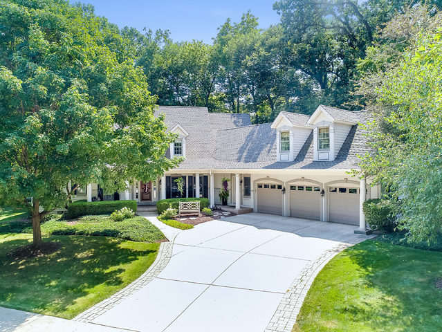 811 Wild Ginger Road Sugar Grove, IL 60554 - Photo 54 of 54 a view of a house with a big yard potted plants and large tree