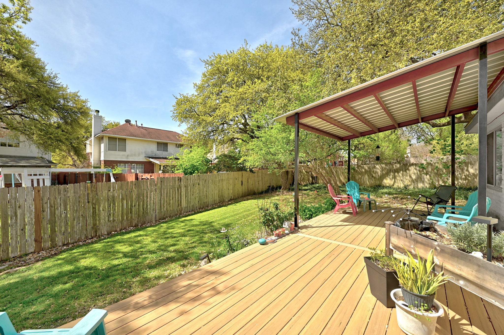 10803 Pinkney Lane Austin, TX 78739 - Photo 31 of 38 Deck featuring a fenced backyard