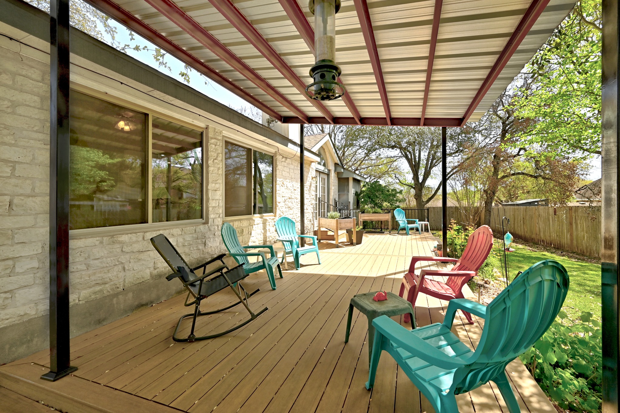 10803 Pinkney Lane Austin, TX 78739 - Photo 33 of 38 Wooden terrace featuring a fenced backyard