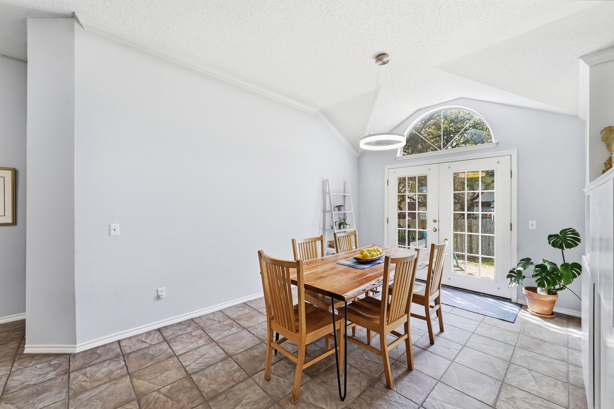 10803 Pinkney Lane Austin, TX 78739 - Photo 9 of 38 Dining area with french doors and baseboards