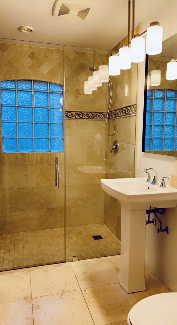 641 North Wright Street Naperville, IL 60563 - Photo 14 of 25 a bathroom with a sink and a shower