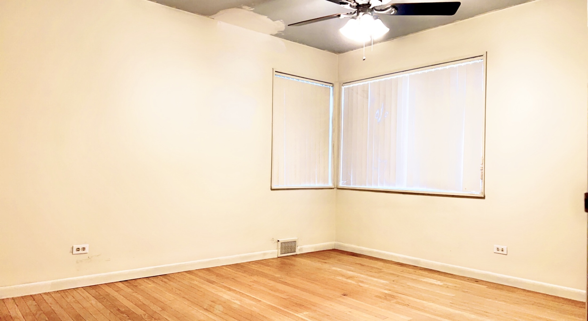 641 North Wright Street Naperville, IL 60563 - Photo 16 of 25 a view of a room with a ceiling fan and a window