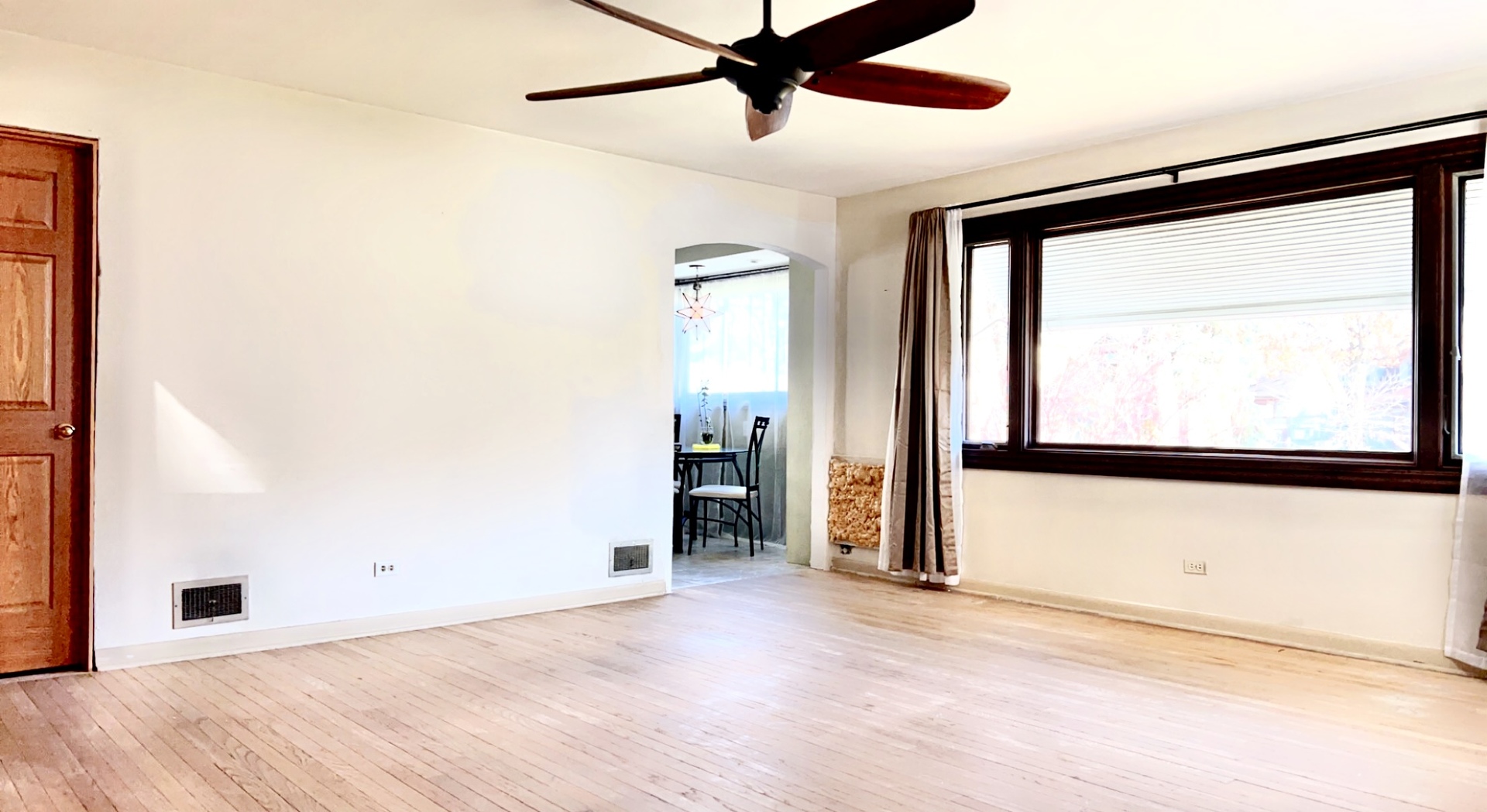 641 North Wright Street Naperville, IL 60563 - Photo 6 of 25 a view of an empty room with a window