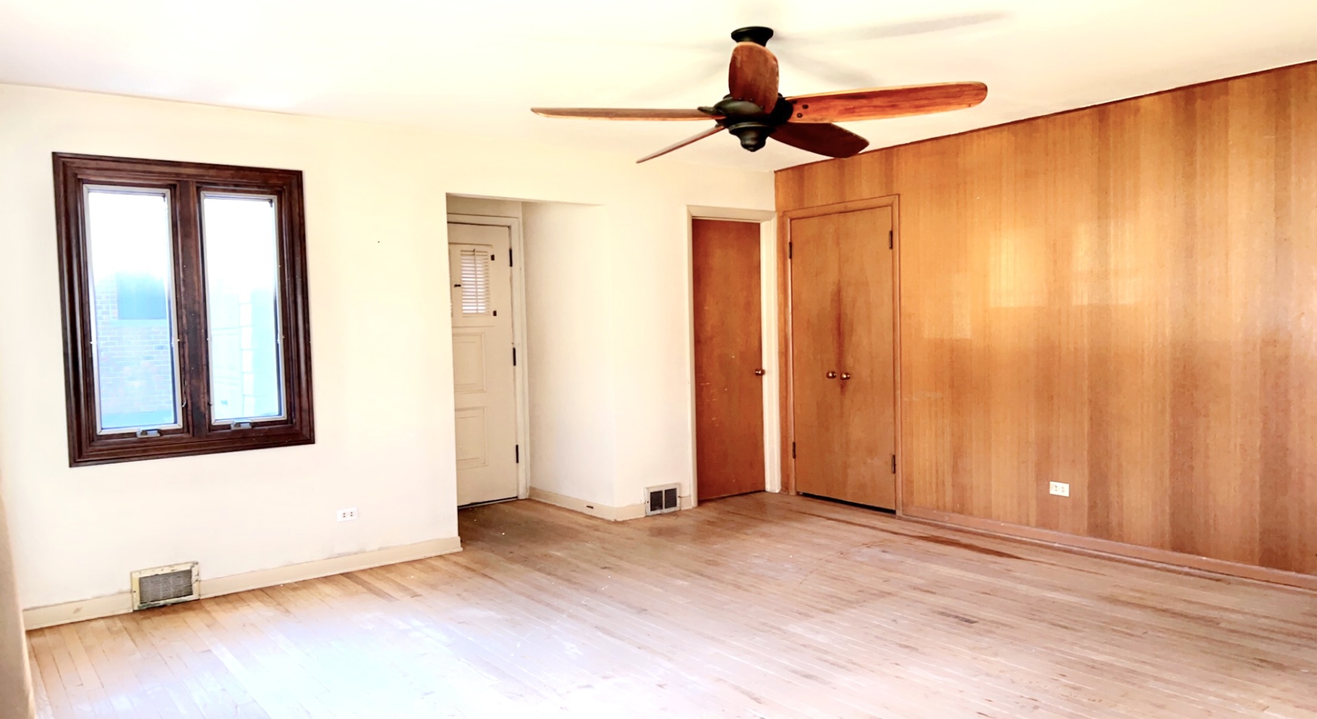 641 North Wright Street Naperville, IL 60563 - Photo 8 of 25 a view of a room with a window and a ceiling fan