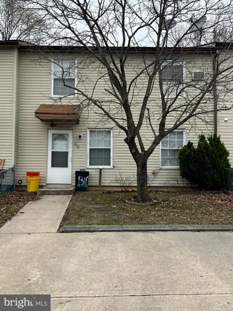 a front view of a house with porch