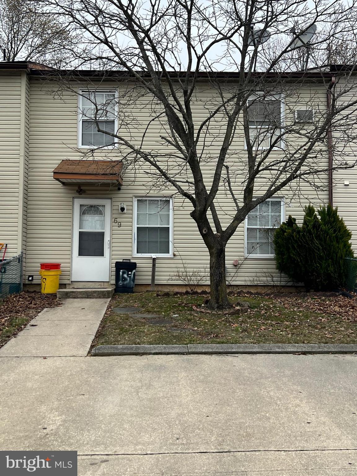 69 Hampshire Road Sicklerville, NJ 08081 - Photo 1 of 12 a front view of a house with porch