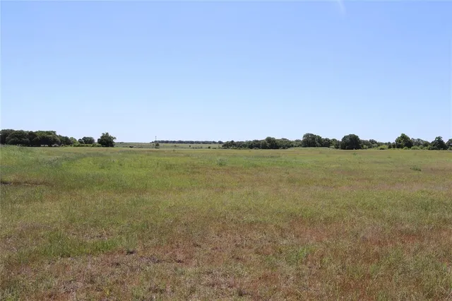 a picture of a bathroom with a shower