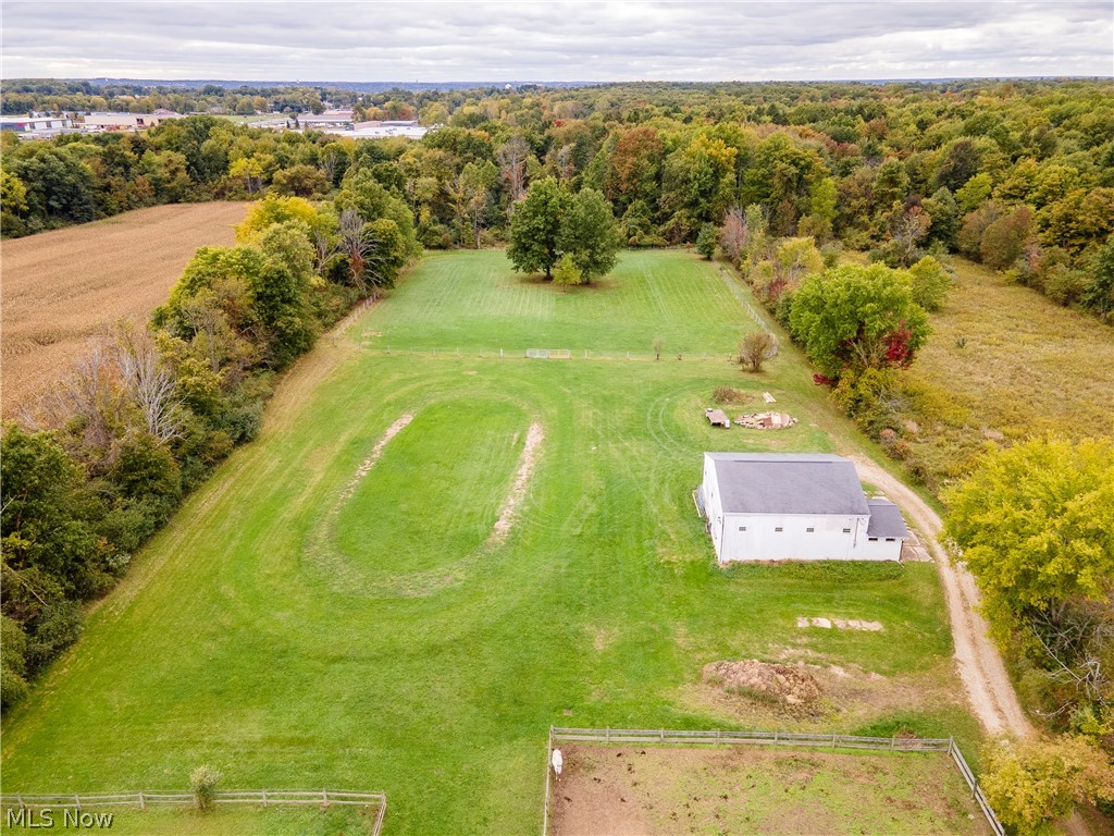 4990 Beach Road Medina, OH 44256 - Photo 31 of 34 Equipment building, outdoor arena and pastures. Trail around the back end for cool downs