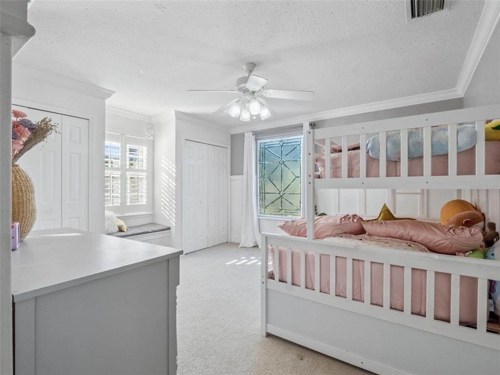 2509 Ridgewind Way Windermere, FL 34786 - Photo 22 of 39 a bedroom with furniture and a window