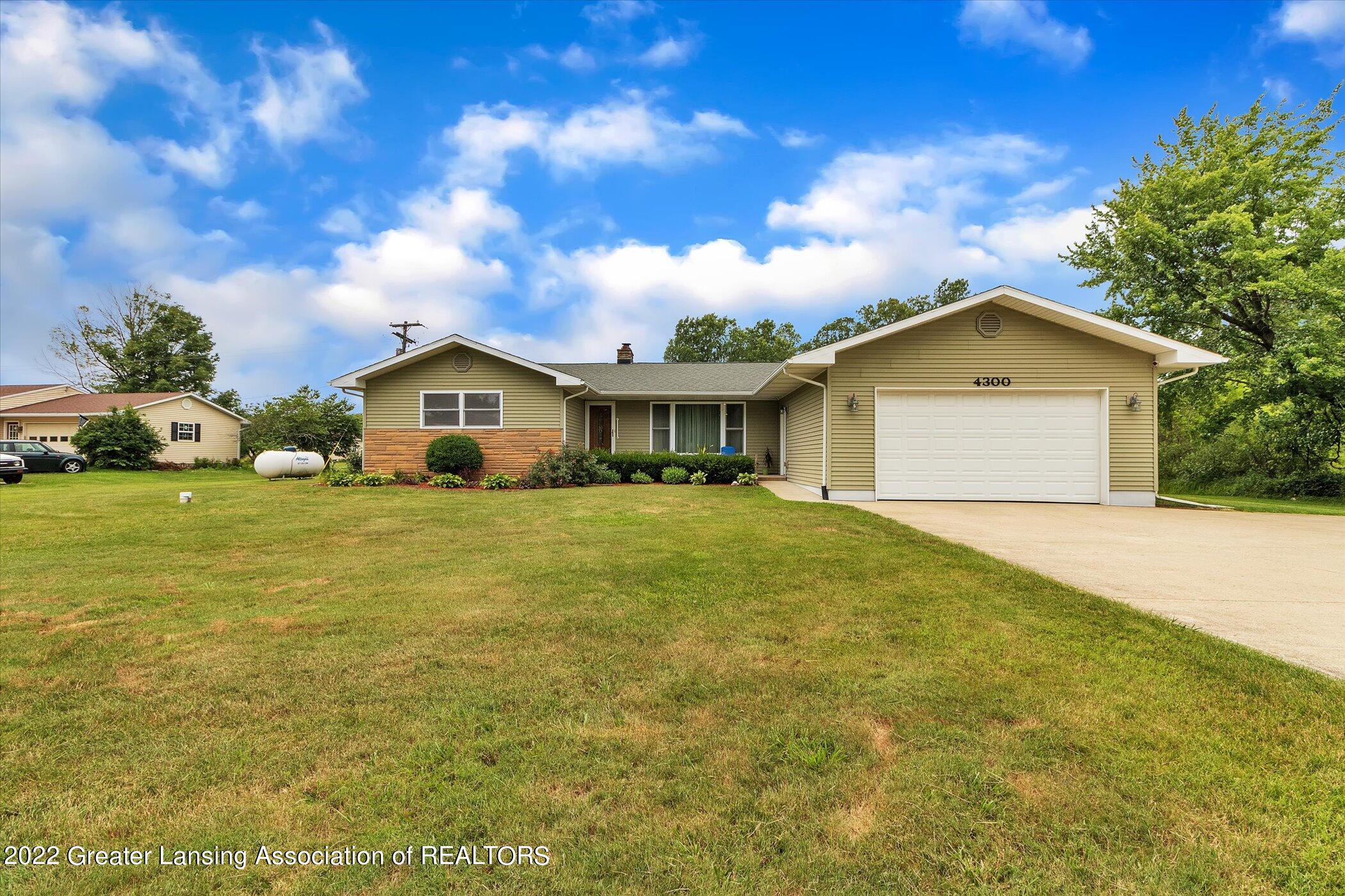 4300 South Cochran Road Charlotte, MI 48813 - Photo 3 of 75 03-4300-S-Cochran-Ave-WindowStill-Real-E