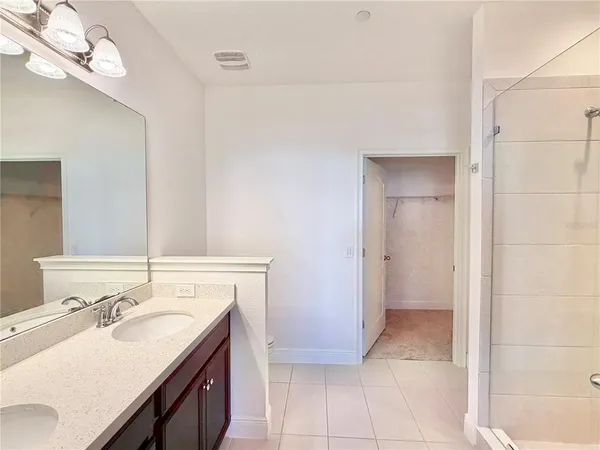 a bathroom with a sink a toilet and a bathtub