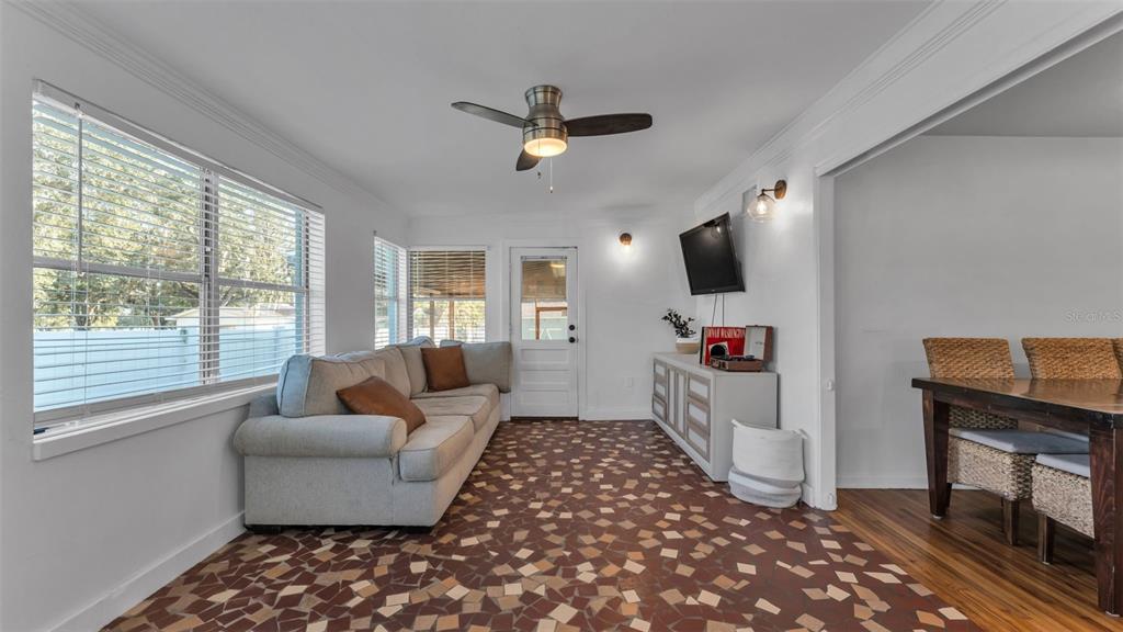 835 Chatfield Street Lakeland, FL 33803 - Photo 22 of 54 a living room with furniture and a flat screen tv