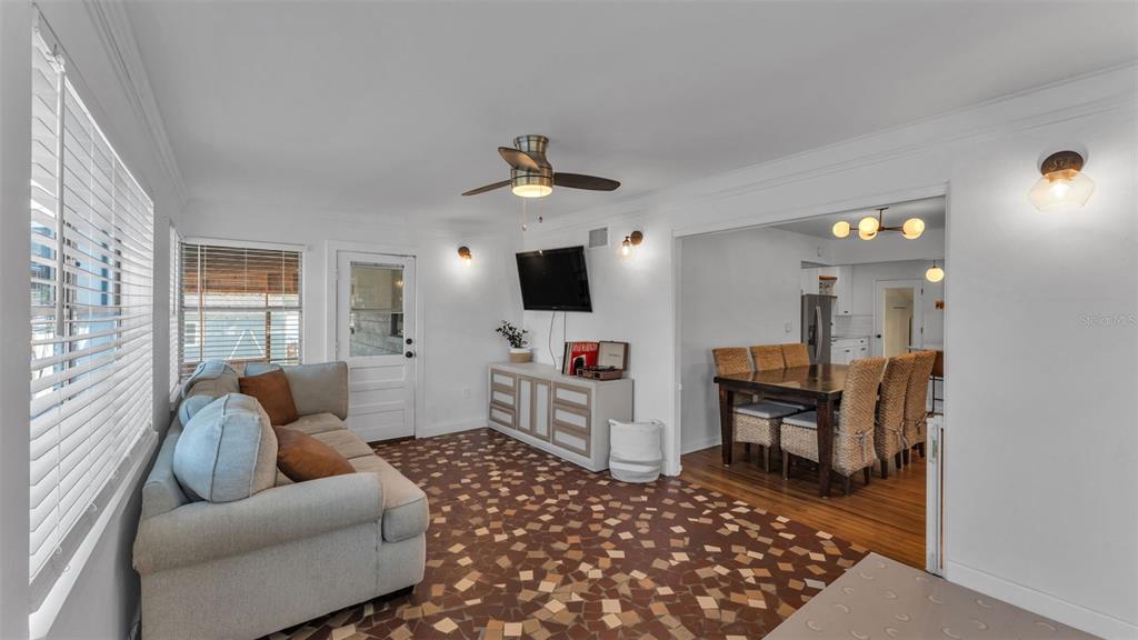 835 Chatfield Street Lakeland, FL 33803 - Photo 23 of 54 a living room with furniture and a flat screen tv