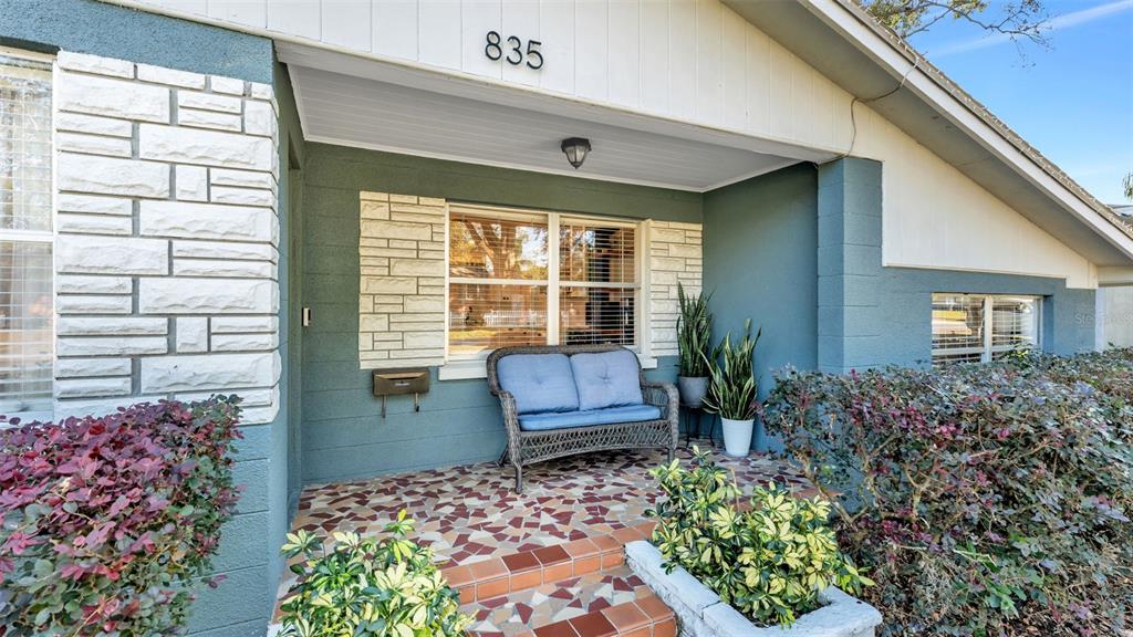 835 Chatfield Street Lakeland, FL 33803 - Photo 4 of 54 a wooden door in front of a house