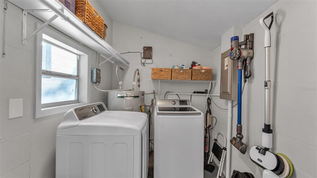 835 Chatfield Street Lakeland, FL 33803 - Photo 41 of 54 a view of storage and utility room with washer and dryer