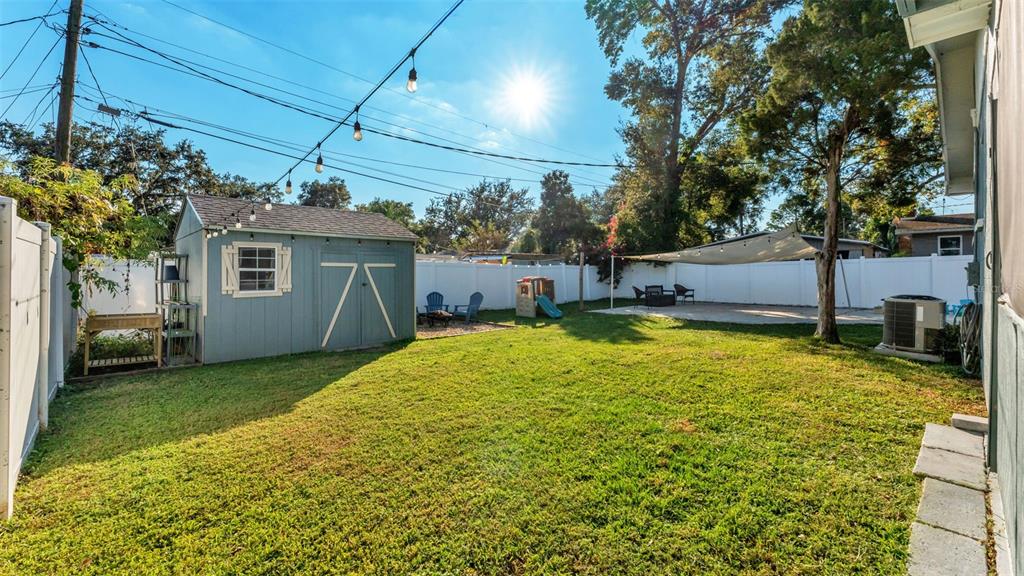 835 Chatfield Street Lakeland, FL 33803 - Photo 45 of 54 a view of a house with a backyard