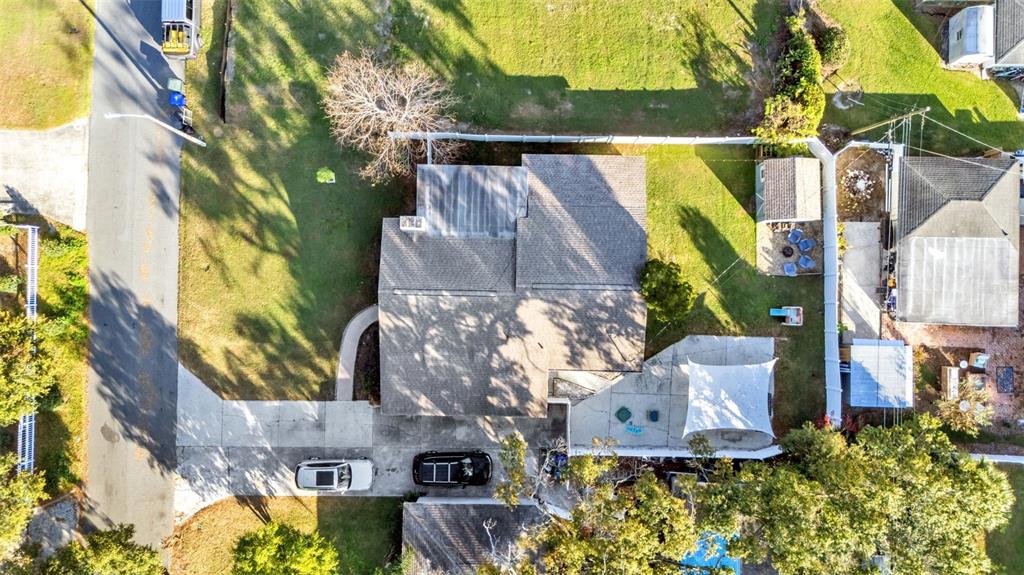 835 Chatfield Street Lakeland, FL 33803 - Photo 50 of 54 an aerial view of residential house with outdoor space and swimming pool