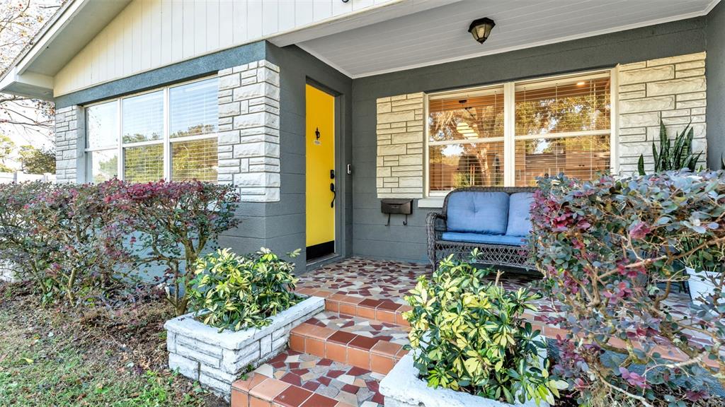 835 Chatfield Street Lakeland, FL 33803 - Photo 5 of 54 a garden view with a seating space